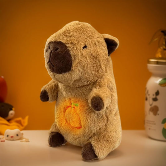 Peluche capibara que respira con luces y sonido